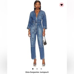 Beautiful denim jumpsuit. Worn once for 2 hrs.